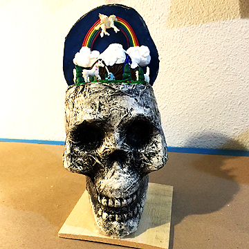 And here is Katie’s diorama that she made in a cheap, plastic Dollar Tree skull.