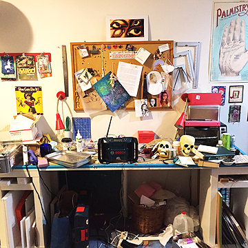 The desk she uses to do all of her arts and crafts, and where Loni and Katie work when making examples for the show. The spaces under the desk hold paper and canvases, and a few tools.