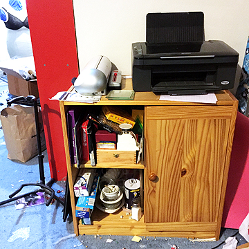 There are more art supplies and papers in this cabinet she uses for her printer.