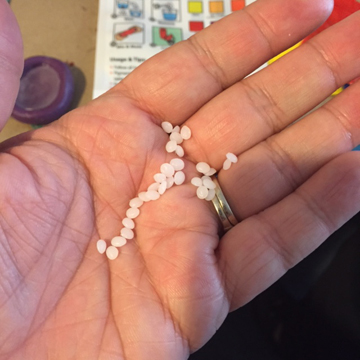 They are tiny little beads of plastic you drop into hot water (140-150 degrees).