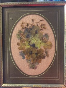 Katie told a story about her mom pressing flowers at the beginning of the show and when she was editing and getting it ready to go up for listening she remembered that she still has a tiny little framed arrangement of flowers that her mom made over 35 years ago. This was made by Katie’s mom Joy, for a very close and beloved family friend, “Aunty Florence/Flo”. After Aunty Flo and Uncle Lynn passed away this made its way back to Katie (she isn’t really sure how). Again, this is at least 35 years old… probably closer to 37 so it has browned with age and can no longer be removed from the frame for fear of it crumbling. This was before good quality archival papers, glass, and glue were easily acquired things.