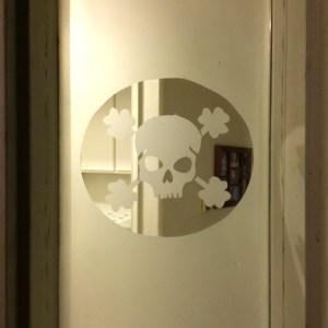 And the glass is not "frosted" with the exception of where the stencil was covering it.